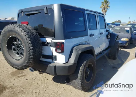 2015 Jeep Wrangler Unlimited Sport z USA, uszkodzony, nr VIN 1C4BJWDG9FL570182